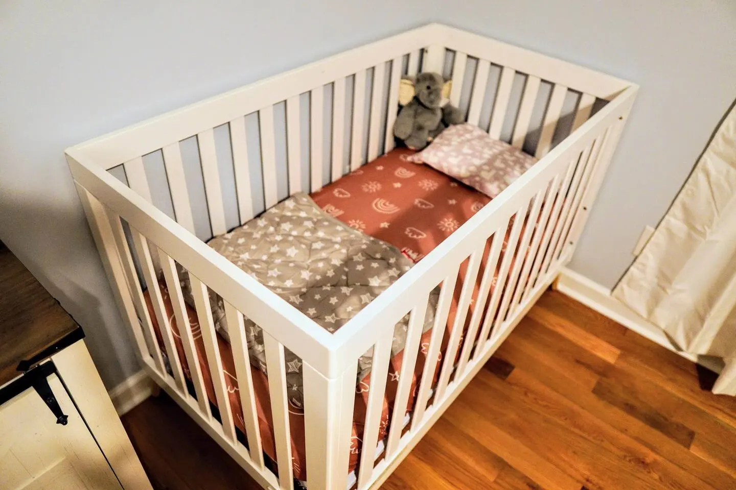 Nursery with two cribs for families traveling with little ones